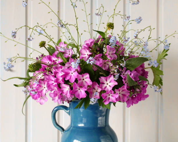 istock floral background, garden spring primroses and forget-me-nots. nature, springtime. 2168489610