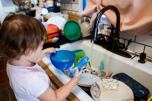 istock Happy Helper Little Girl 2168498014