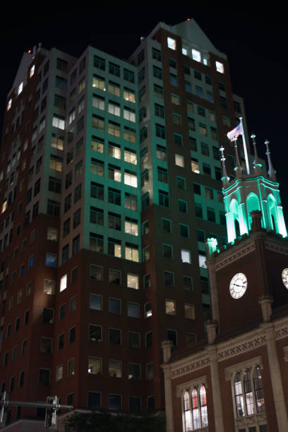 A shot looking upward at the buildings comprising the city hall plaza, downtown in Manchester, NH.