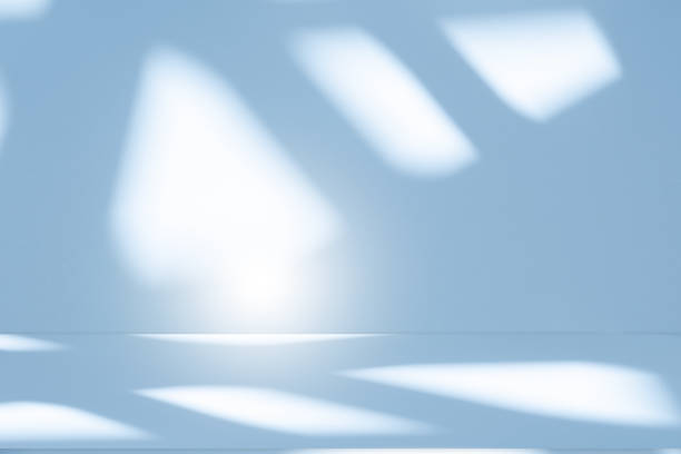 istock Studio style background wall decoration presentation uses white and blue tones. with shadows cast from a nearby window, concept creating a decorative 2168502146