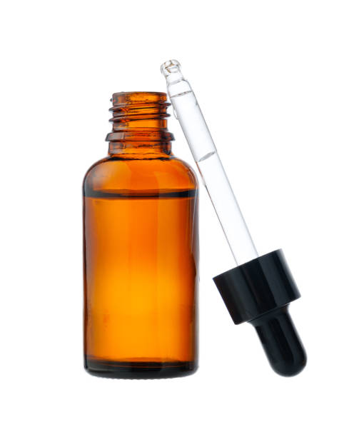 istock Amber Glass Bottle With Dropper on White Background 2168504094