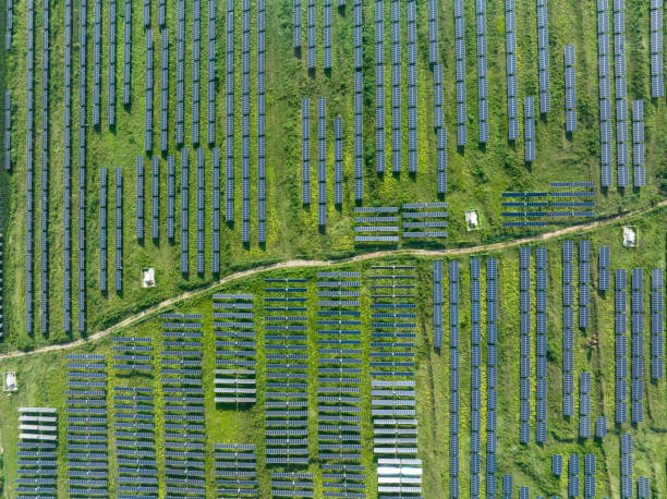 istock view of solar power station on green hill 2168504921