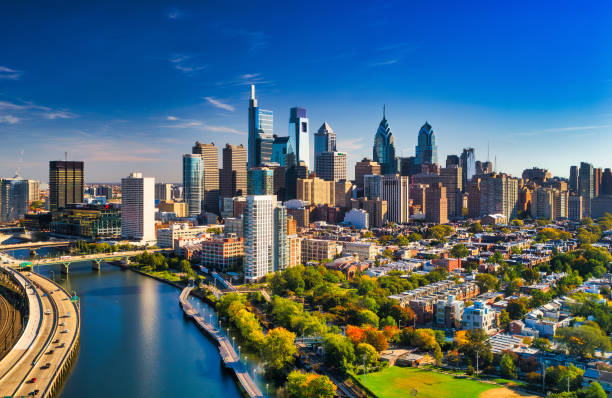 Philadelphia Skyline Aerial View With River And Blue Sky