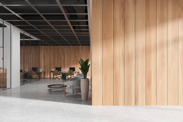 istock Modern business interior with desks and pc computers, glass rooms. Empty wall 2168511080