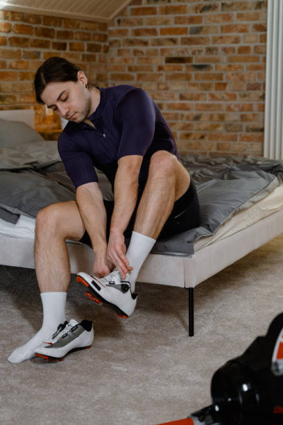 istock A man puts on sneakers for exercise 2168511088