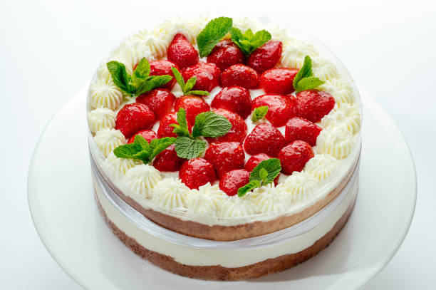istock cake with berries, cream and chocolate on a white background 2168513006