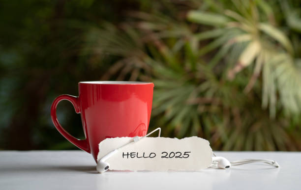 istock Hello 2025 on paper next to cup of coffee. 2168515761