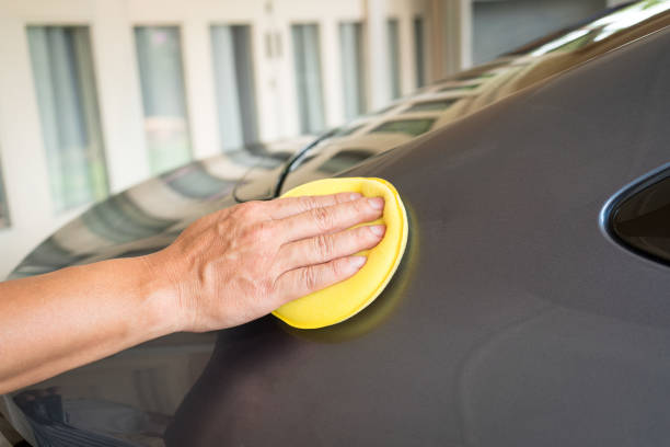 istock Man waxing or polishing car. 2168515784