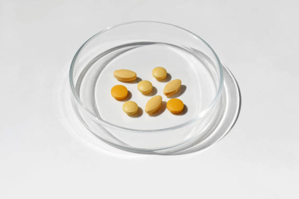 istock Different pills in a petri dish 2168516677