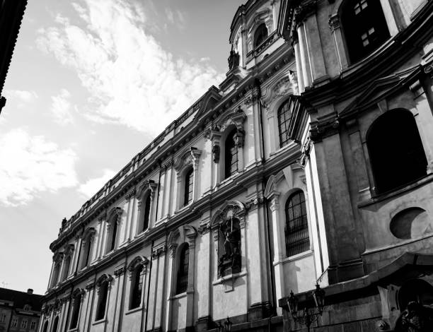 Low angle view of beautiful buildings against sky in black and white