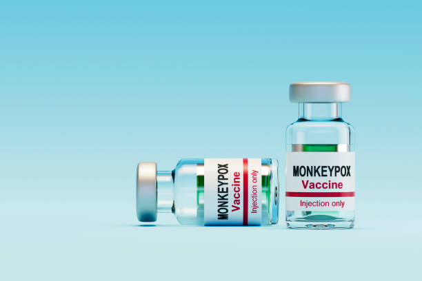istock Monkeypox Virus Vaccine Vial on Blue Background 2168521985