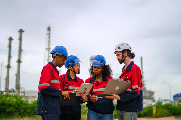 istock Blue collar workers are working at industrial site. 2168522633