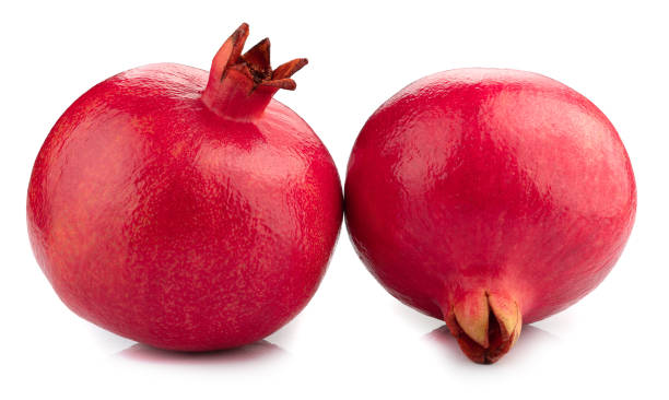 Ripe pomegranate fruit isolated on white background