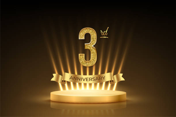 istock Third anniversary gold award podium. 3 year celebration birthday or jubilee golden vector background. Luxury stage with glowing rays, glittering number 3 and ribbon with text anniversary on black 2168528741