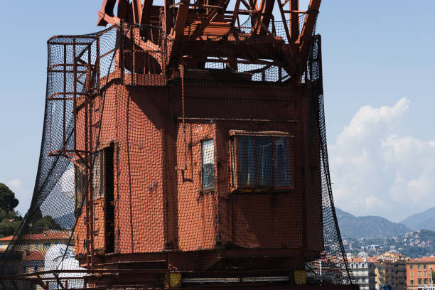 The port crane cabin is protected by a mesh, close-up photo.