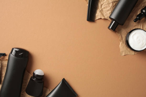 istock Bathroom SPA shampoo bottles with cream and deodorant on brown background. Flat lay, top view. 2168535293