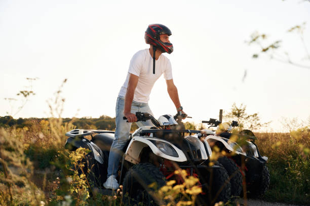 istock Man is on the ATV outdoors 2168538526