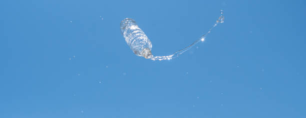 istock A plastic bottle overflowing with water in the air 2168540418