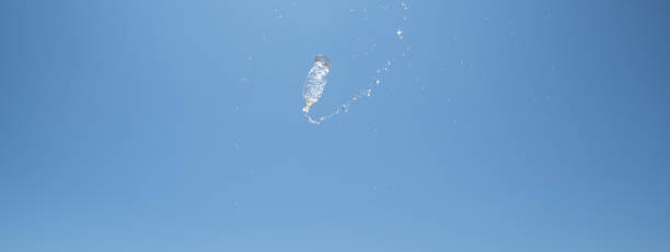 istock A plastic bottle overflowing with water in the air 2168540449