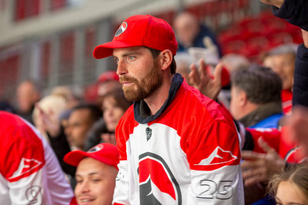 istock Focused Fan Observing the Game 2168544442