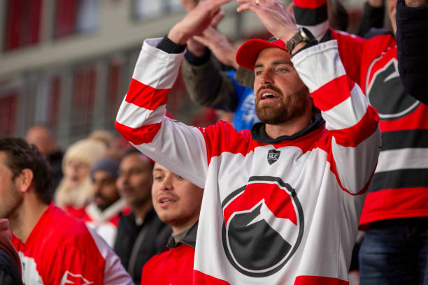 istock Enthusiastic Sports Fan Cheering 2168544443