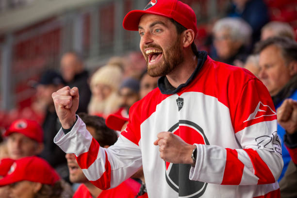 istock Ecstatic Hockey Fan Celebrating a Victory 2168545457