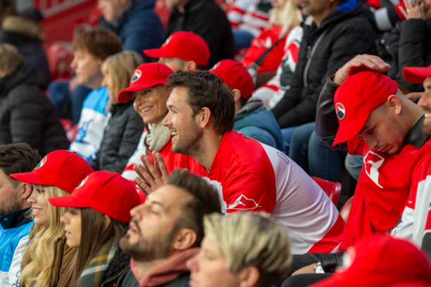 istock Engaged Hockey Fans Watching the Game 2168546007