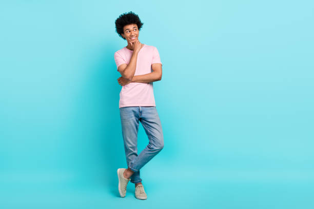 istock Full body size photo of young thoughtful intelligence guy touch chin looking empty space genius decision invention isolated on cyan color background 2168550059