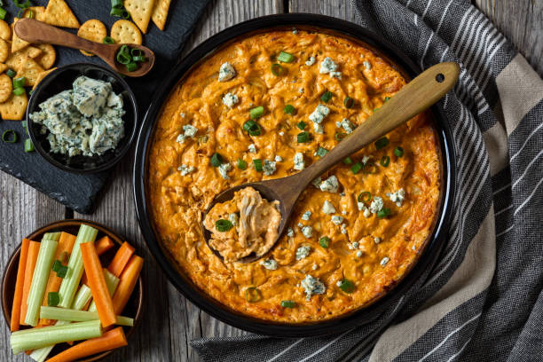 istock hot buffalo chicken dip in baking dish, top view 2168551156