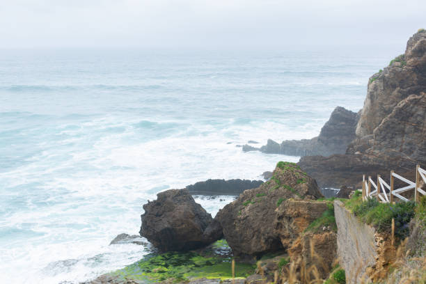 impressive waves on the famous Nazaré North Beach. High quality photo