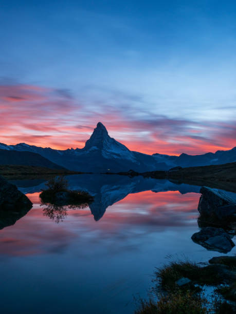 istock Epic sunset at the Stellisee with view to Matterhorn 2168560101