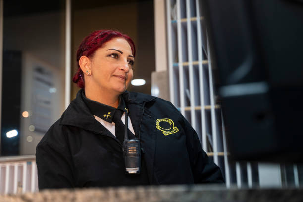 istock Female security personnel checking cameras 2168561550