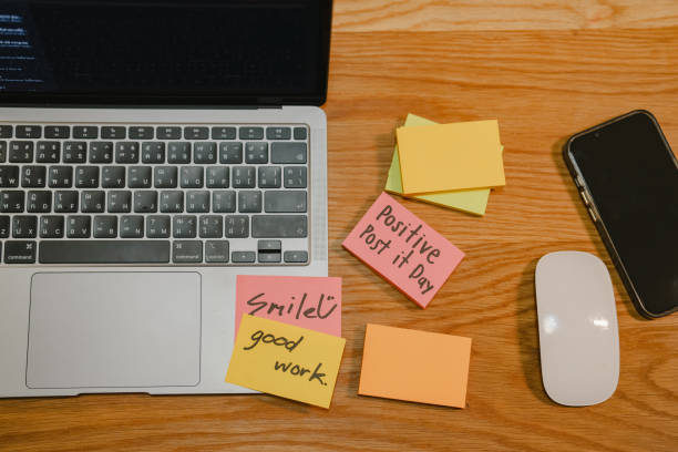 istock Adding a message sticker on board. Closeup of creative business team brainstorming ideas and concepts 2168567409