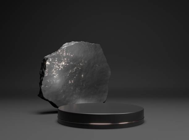 istock Round rough stone pedestal. Black cylinder on dark background. 2168575344
