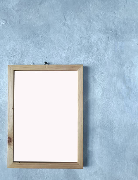 istock Blank photo frame mock-up on the wall. 2168578932