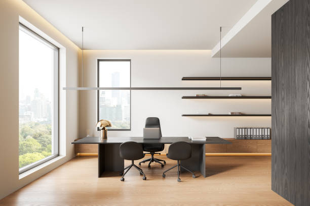 istock Modern office with a sleek desk, chairs, and shelves, light decor, city view through large windows, minimalistic style, bright interior design.  3D Rendering 2168579511