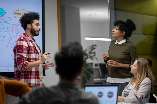 istock Business people talking in conference room 2168582685