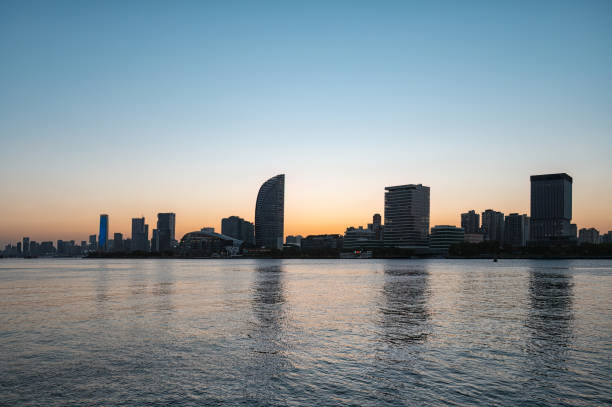 istock Shanghai urban riverside scenery at dusk 2168584092