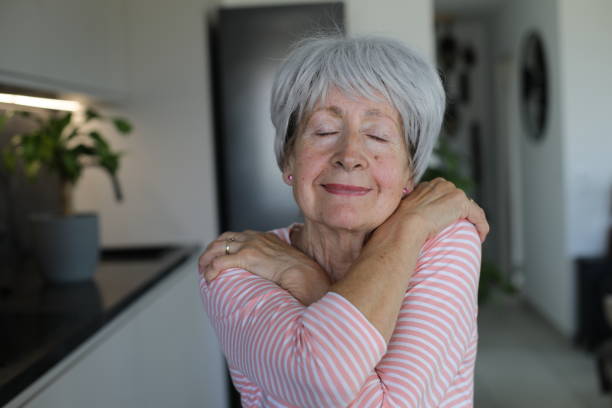 istock Senior woman feeling self love 2168585757