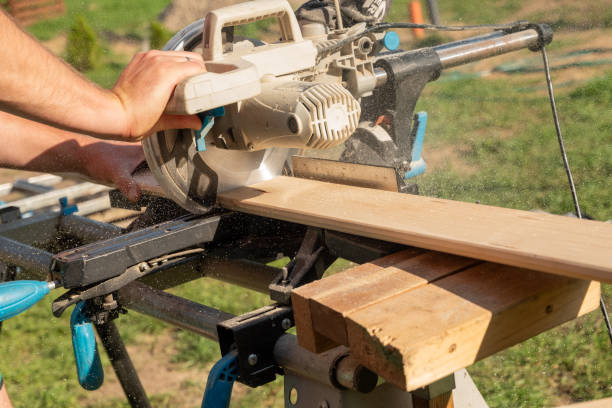 istock cutting a wooden plank with a table saw (bench saw) to make a diy table 2168586263