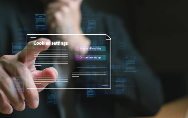 istock hand using computer laptop while choose to accept internet cookies policy or reject. Customer data privacy concept that allow web browser to collect user data to resell or use for marketing purpose. 2168586275