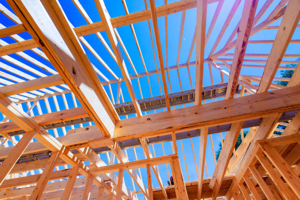 istock Building a new home using timber trusses framed with joints in roofing 2168588401