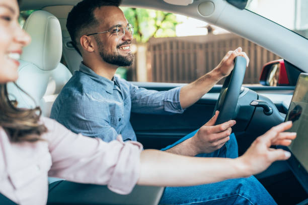 istock Young couple in the car 2168591610