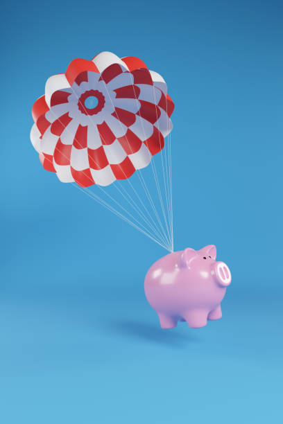 istock Piggy bank falling in a parachute. 3d illustration. 2168593786
