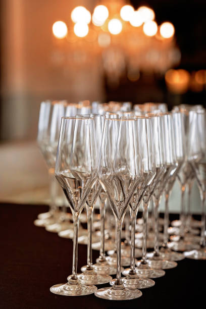 istock Champagne glasses in a row prepared for an event. Banquet setting 2168599714