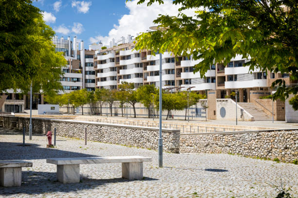 New complex of apartment buildings with green trees in the Moscavide district, Lisbon, Portugal