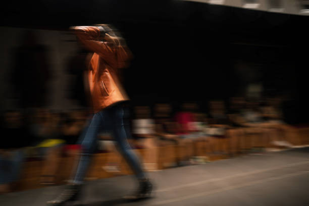 istock Fashion Model Walking Down the Runway at High Speed 2168604363