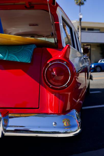 istock Vintage red and white surf wagon at the beach 2168604914