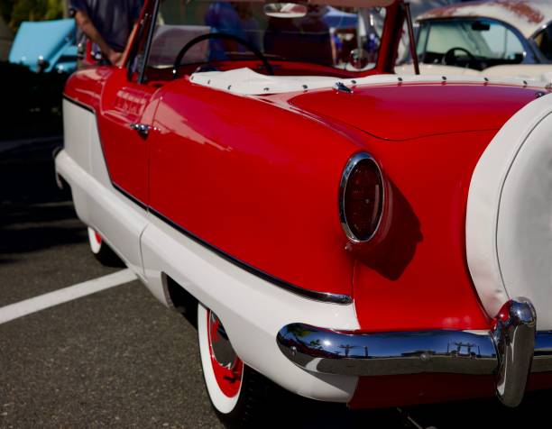 West Palm Beach, USA - January 13, 2013: Closeup view of the grill, Chevy logo, and hood ornament of a vintage 1955 Chevy Bel Air automobile.