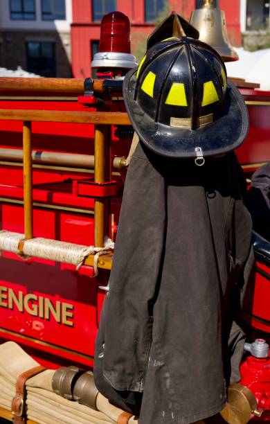 istock Vintage fire engine with protective clothing and equipment 2168606199